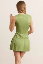 Ensemble gilet et jupe plissée avec boutons ornés