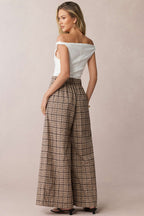 Pantalon taille haute double boutonnage à carreaux