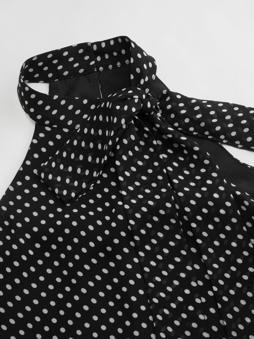 Top dos nu fluide à pois noué