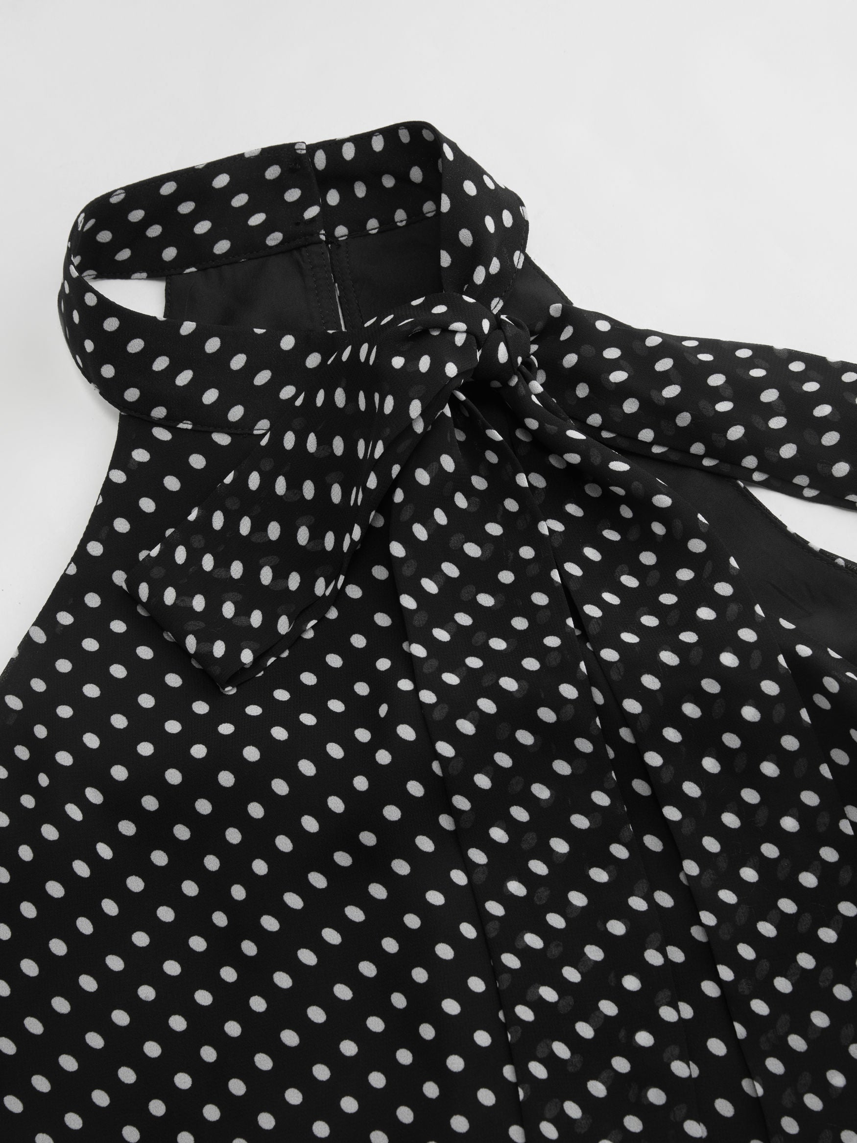 Top dos nu fluide à pois noué