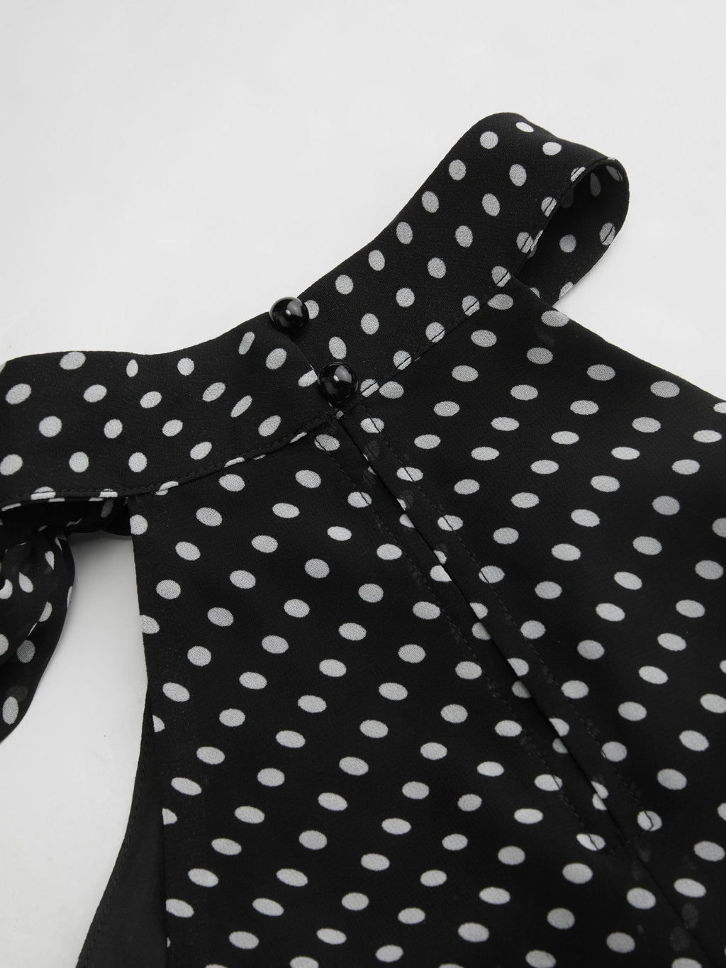 Top dos nu fluide à pois noué