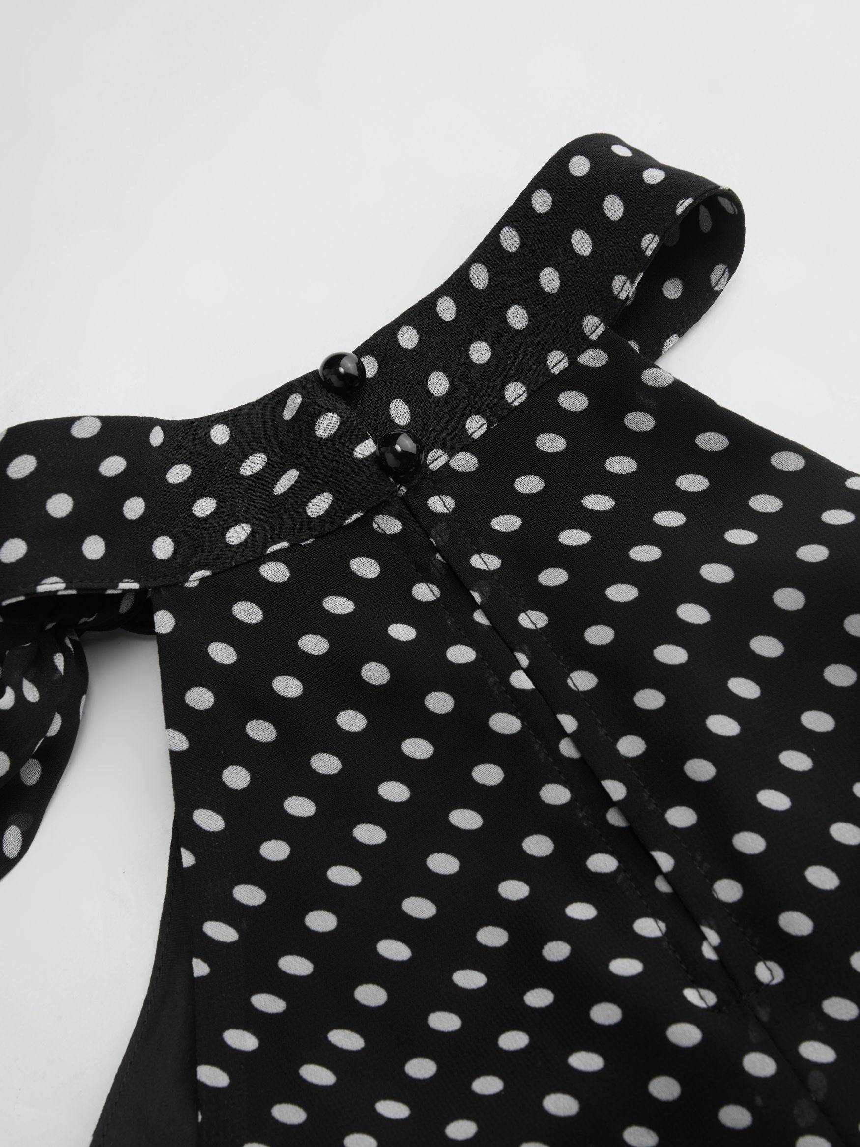 Top dos nu fluide à pois noué