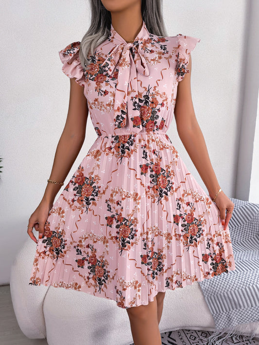 Robe bohème plissée à imprimé floral et col lavallière