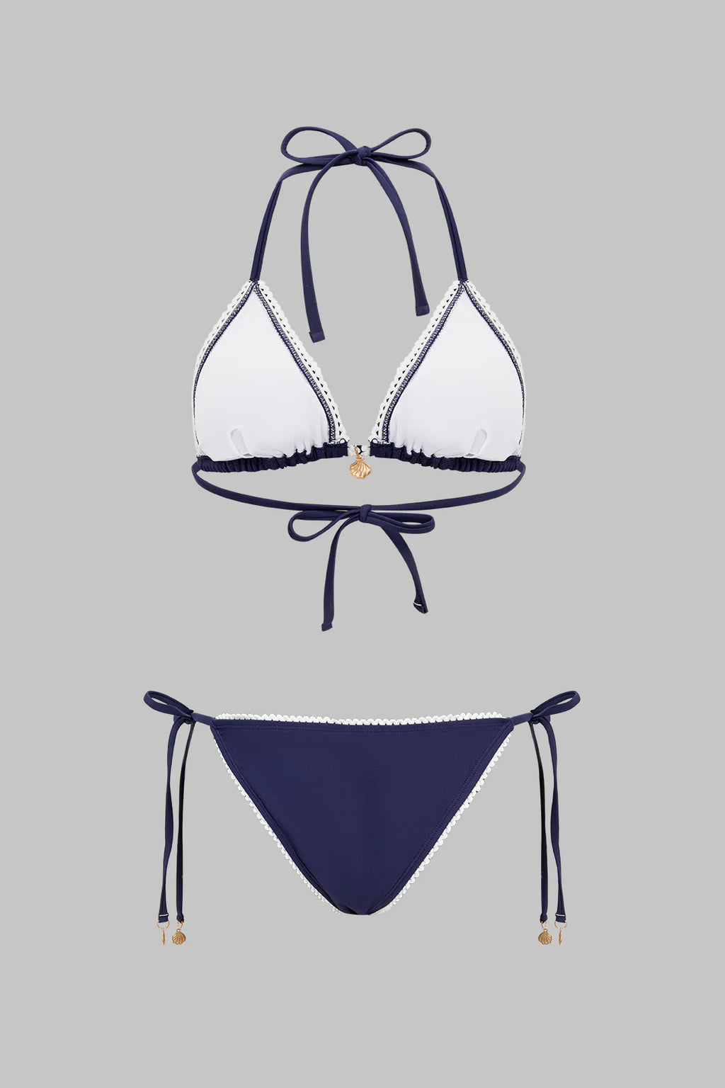 Bikini triangle bleu marine à bordure dentelle