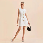 Mini robe sans manches boutons dorés