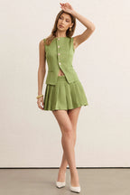 Ensemble gilet et jupe plissée avec boutons ornés