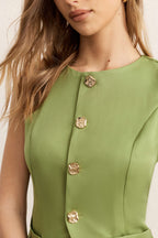 Ensemble gilet et jupe plissée avec boutons ornés