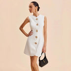 Mini robe sans manches boutons dorés