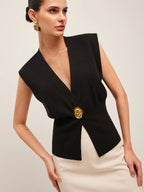 Gilet tailleur à bouton bijou doré