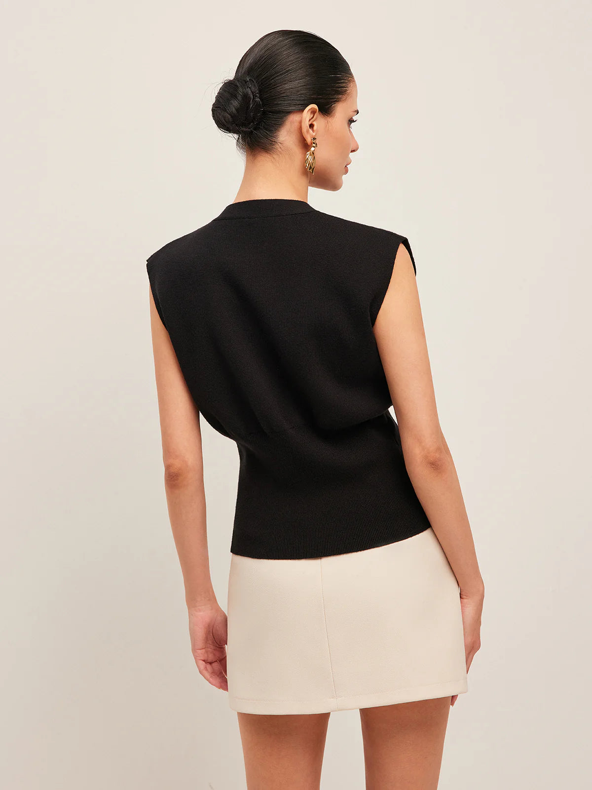 Gilet tailleur à bouton bijou doré