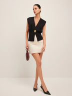 Gilet tailleur à bouton bijou doré