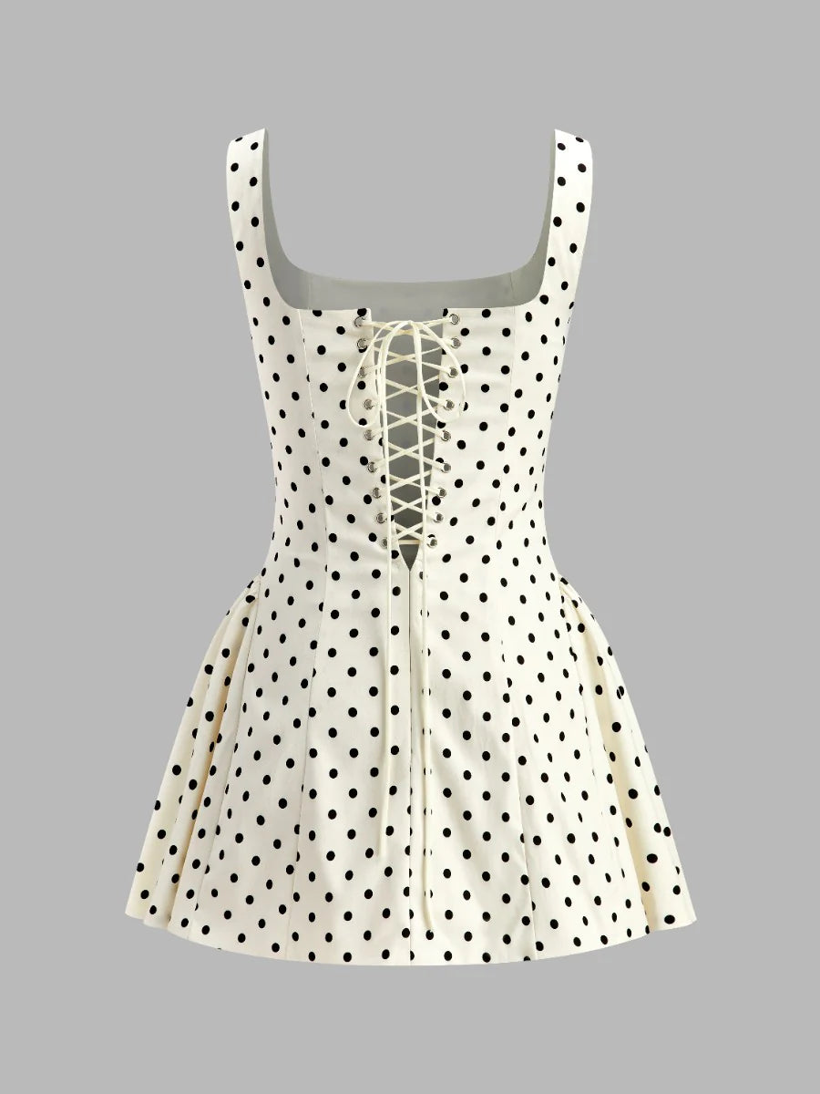 POLKA Robe à dos lacets à pois