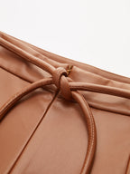 Short plissé en simili cuir