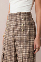 Pantalon taille haute double boutonnage à carreaux