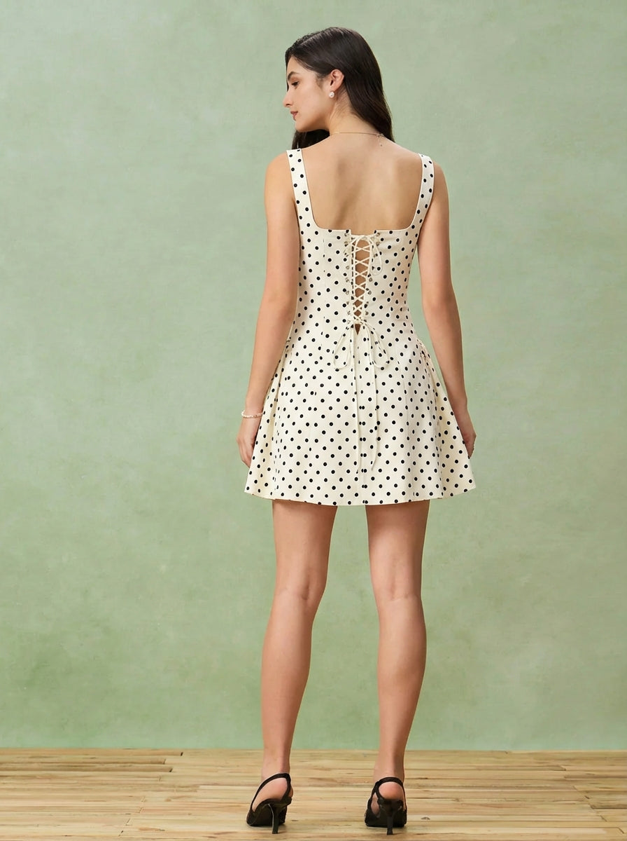 POLKA Robe à dos lacets à pois